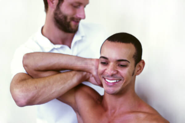 Osteopath Dr Christoph Datler providing osteopathic treatment for shoulder and neck pain